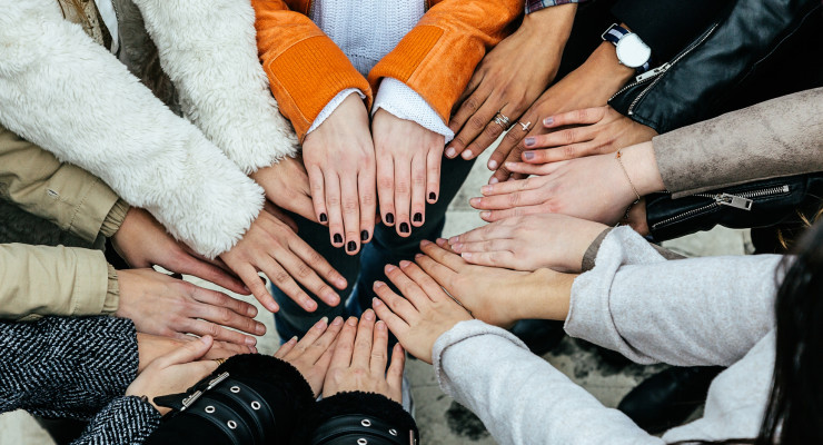 Friends Stacking Hands